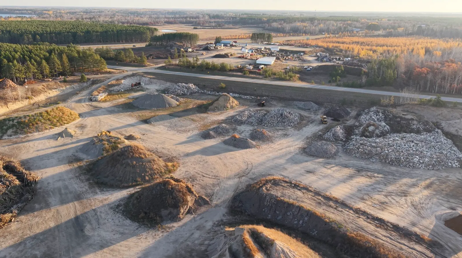 Aerial view of the Shepard Excavating yard and aggregate piles in Laporte, MN