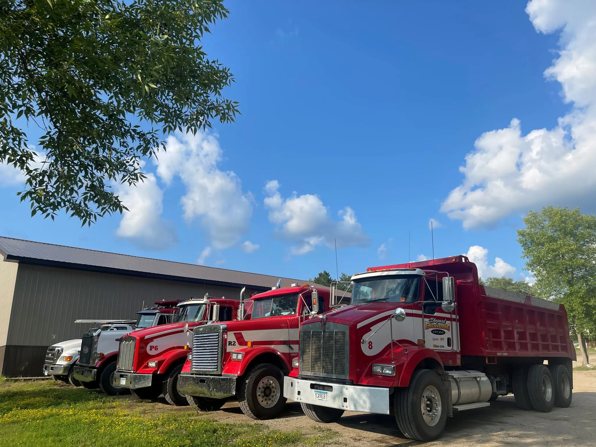 Shepard Excavating truck fleet at the shop in Laporte, MN