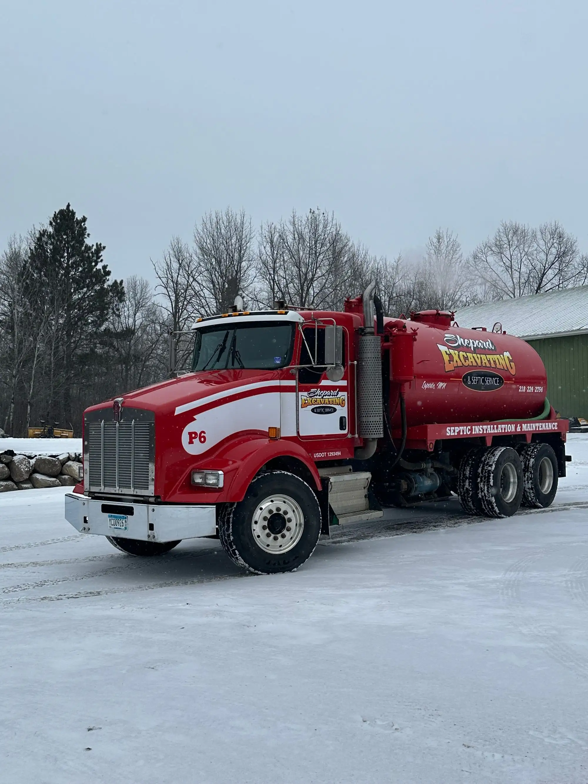 The Shepard Excavating septic pump truck P6 ready to roll in winter