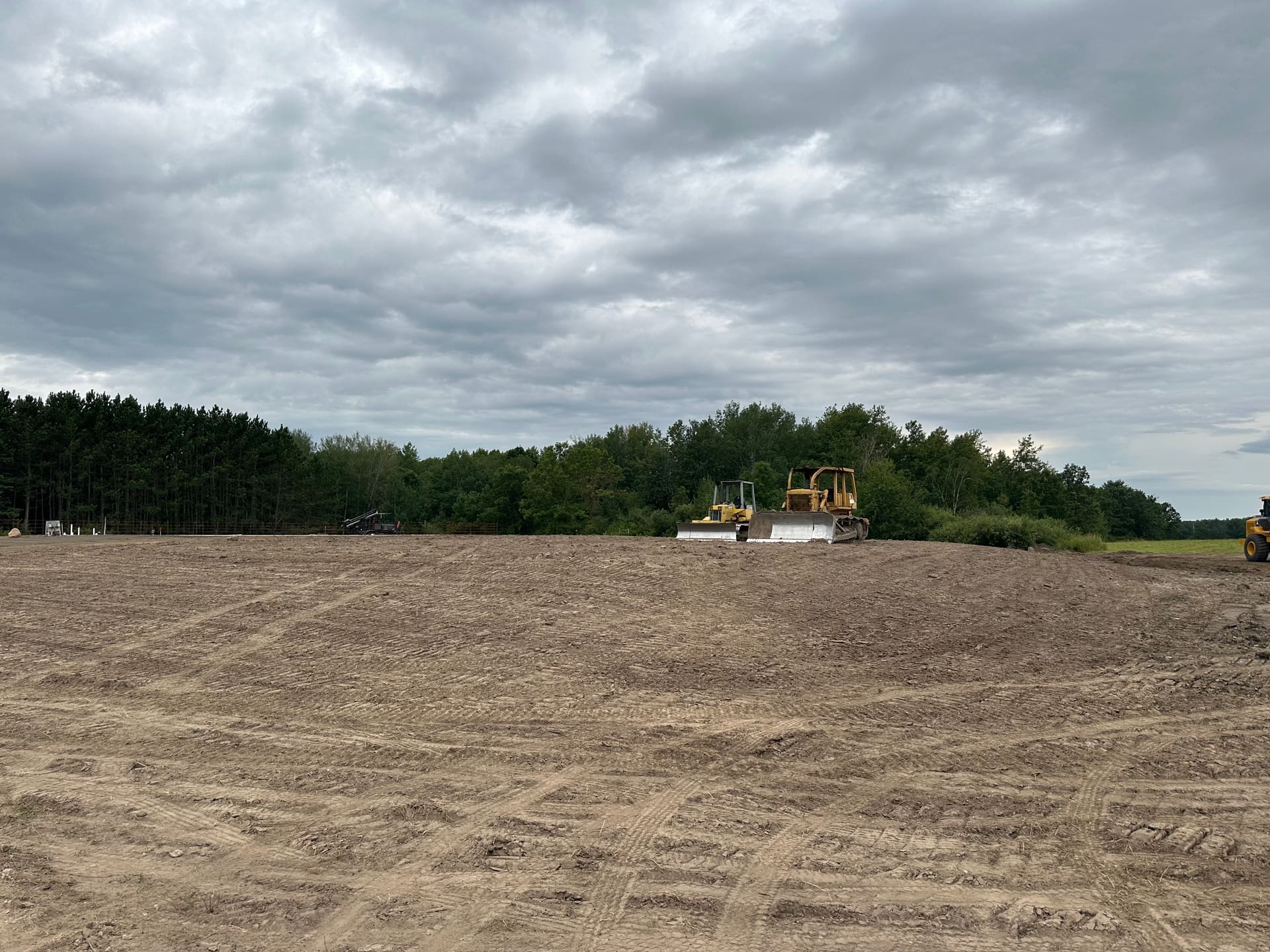 Shepard Excavating equipment moving sand and screening material at the pit